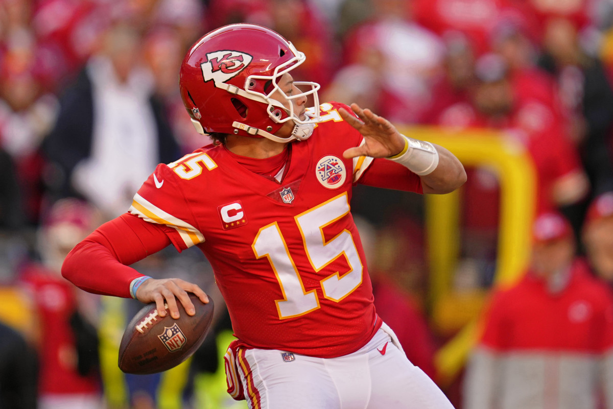 Jan 30, 2022; Kansas City, Missouri, USA; Kansas City Chiefs quarterback Patrick Mahomes (15) passes the ball against the Cincinnati Bengals during the second quarter of the AFC Championship Game at GEHA Field at Arrowhead Stadium. Mandatory Credit: Jay Biggerstaff-USA TODAY Sports